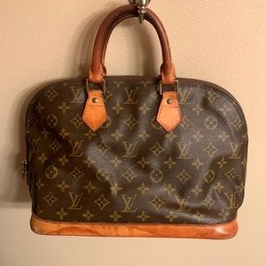 Authentic Louis Vuitton monogram Alma purse with date code BA0914